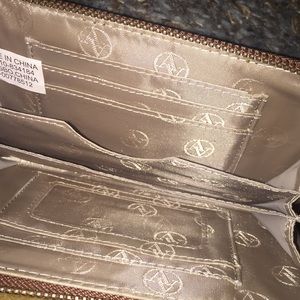 Adrienne Vittadini Bags - NWOT Adrienne vitadini brown leather wallet Adrienne Vittadini Bags - NWOT Adrienne vitadini brown leather wallet